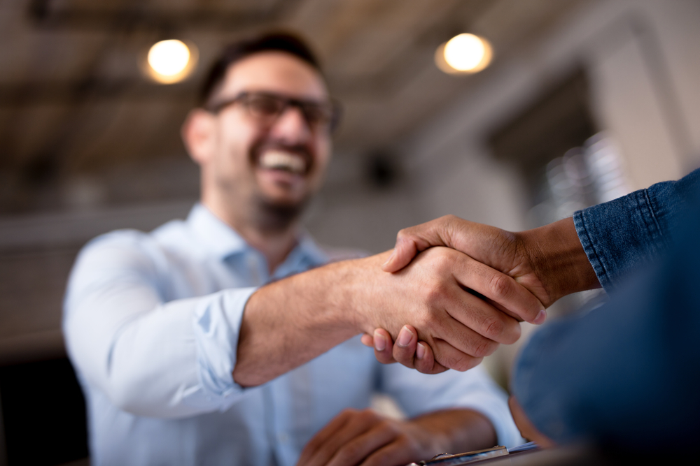 Business Executive hire shaking hands